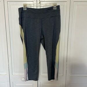 Women’s workout leggings in gray yellow, blue and white